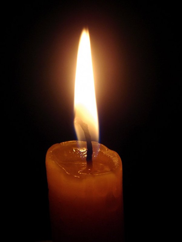 Горящая свеча