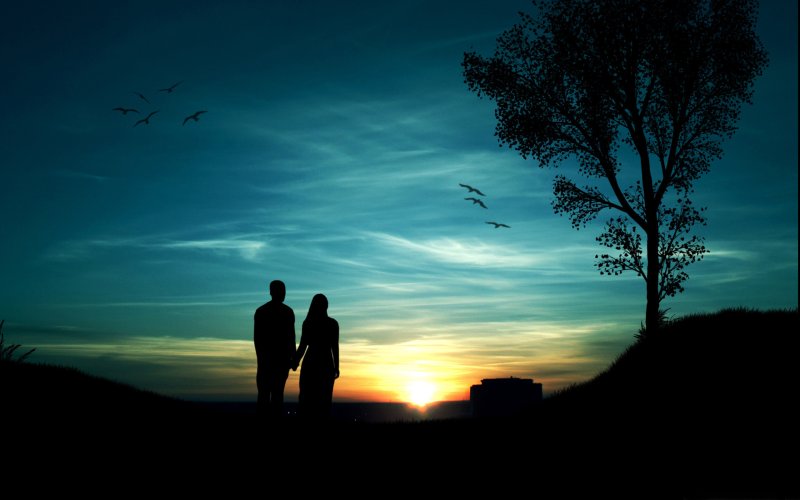 Силуэты влюбленных на закате