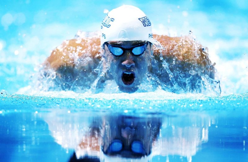 Майкл Фелпс и шапки для плавания