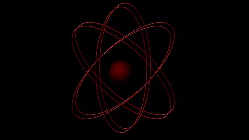 Атом на черном фоне