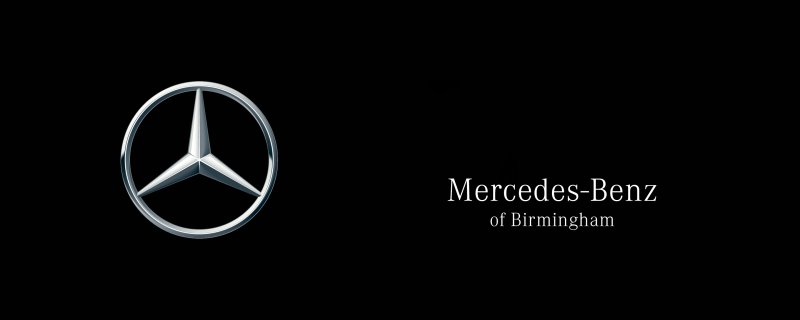 Знак Мерседес на черном фоне