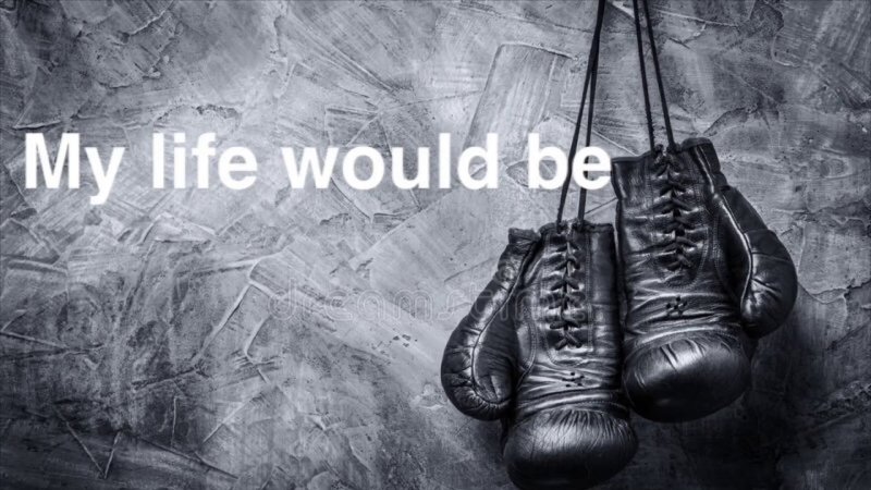 Боксерские перчатки на ринге