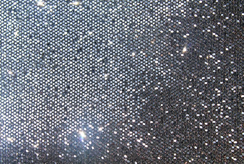 Серебристый материал с блестками