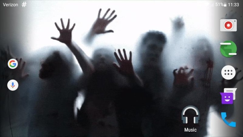 Заставка на рабочий стол зомби за стеклом