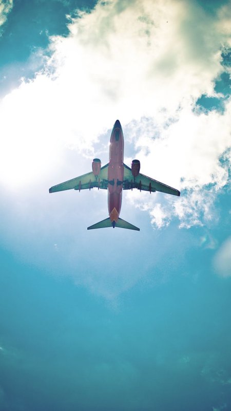 Самолет вертикально