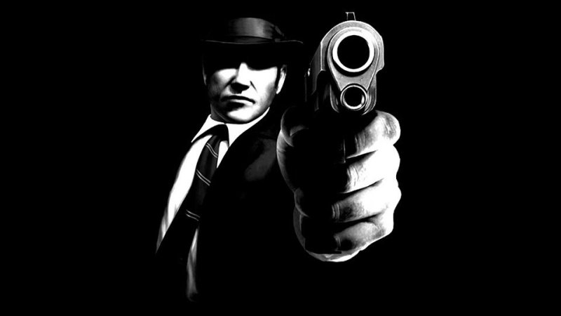 Гангстер на черном фоне
