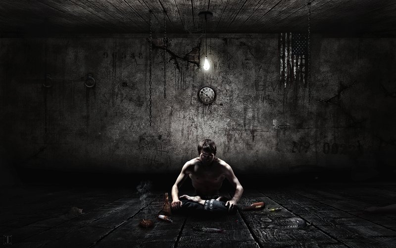 Человек в темной комнате