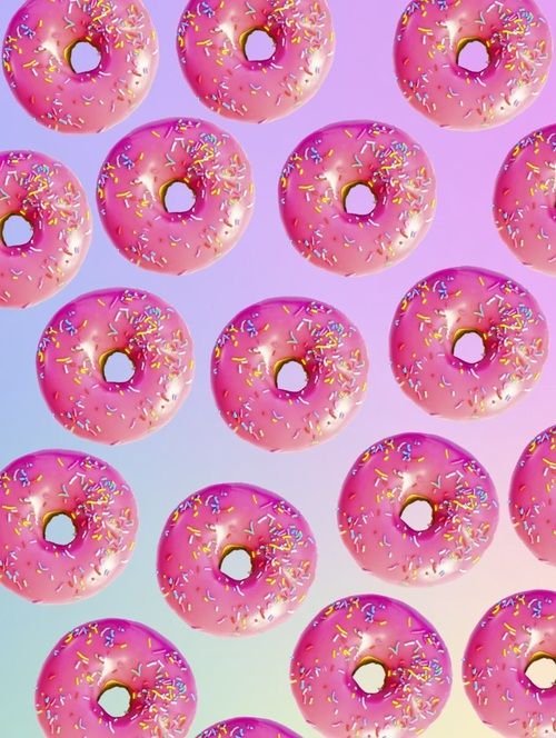 Пончики на розовом фоне