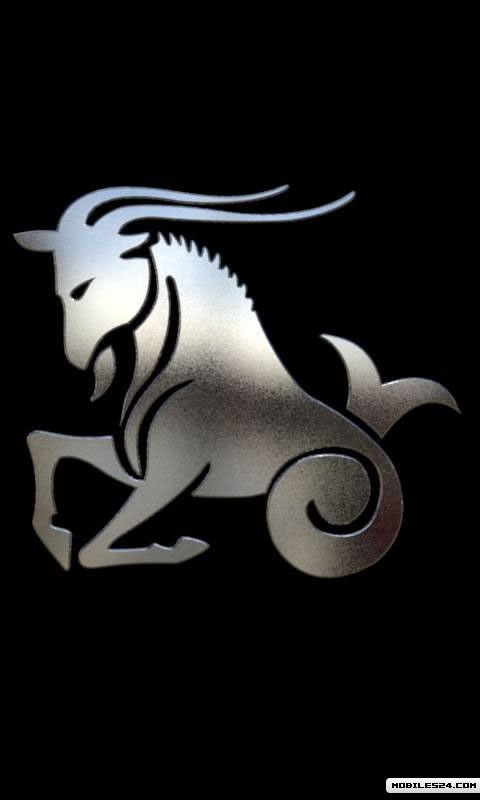 Козерог на черном фоне