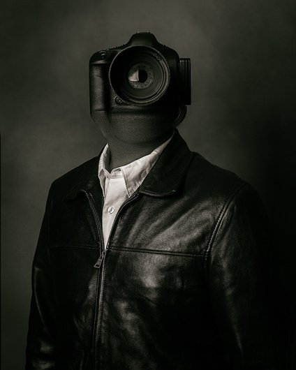 Фотограф с камерой